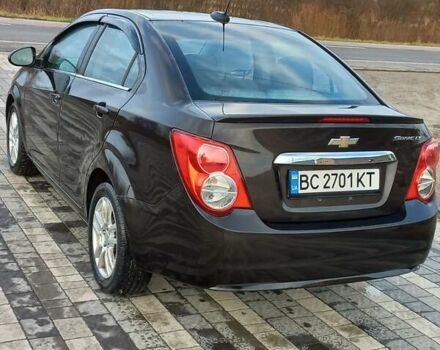 Черный Шевроле Соник, объемом двигателя 1.8 л и пробегом 210 тыс. км за 7500 $, фото 4 на Automoto.ua
