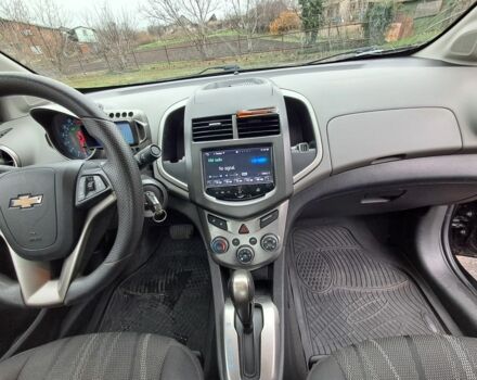 Черный Шевроле Соник, объемом двигателя 1.8 л и пробегом 101 тыс. км за 5400 $, фото 7 на Automoto.ua