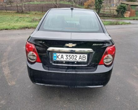 Черный Шевроле Соник, объемом двигателя 1.8 л и пробегом 101 тыс. км за 5400 $, фото 6 на Automoto.ua