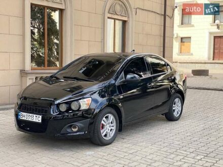 Черный Шевроле Соник, объемом двигателя 1.8 л и пробегом 250 тыс. км за 3750 $, фото 1 на Automoto.ua