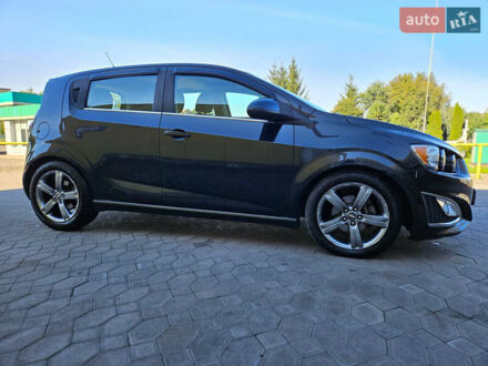 Черный Шевроле Соник, объемом двигателя 1.36 л и пробегом 144 тыс. км за 7500 $, фото 1 на Automoto.ua