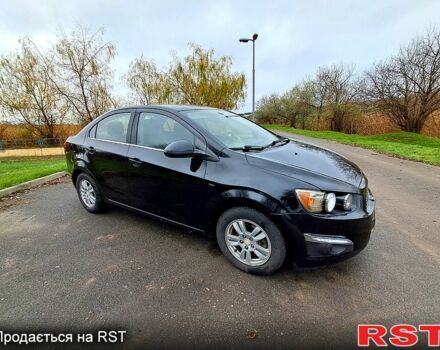 Черный Шевроле Соник, объемом двигателя 1.8 л и пробегом 103 тыс. км за 5500 $, фото 1 на Automoto.ua