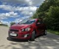 Красный Шевроле Соник, объемом двигателя 1.8 л и пробегом 163 тыс. км за 8000 $, фото 1 на Automoto.ua