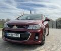 Красный Шевроле Соник, объемом двигателя 1.36 л и пробегом 98 тыс. км за 8600 $, фото 1 на Automoto.ua