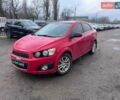 Красный Шевроле Соник, объемом двигателя 1.8 л и пробегом 194 тыс. км за 6900 $, фото 1 на Automoto.ua