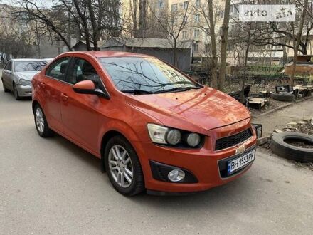 Шевроле Соник 2013 в Одессе на Automoto.ua Красный Шевроле Соник, объемом двигателя 1.8 л и пробегом 140 тыс. км за 6500 $, фото 1 на Automoto.ua