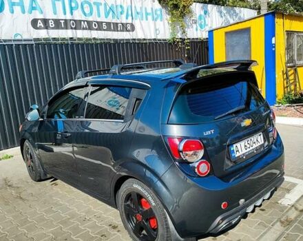 Серый Шевроле Соник, объемом двигателя 1.8 л и пробегом 220 тыс. км за 9000 $, фото 11 на Automoto.ua