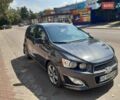 Серый Шевроле Соник, объемом двигателя 1.4 л и пробегом 85 тыс. км за 10500 $, фото 1 на Automoto.ua