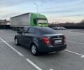 Серый Шевроле Соник, объемом двигателя 1.8 л и пробегом 300 тыс. км за 6600 $, фото 4 на Automoto.ua