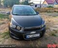 Серый Шевроле Соник, объемом двигателя 1.8 л и пробегом 129 тыс. км за 7000 $, фото 1 на Automoto.ua