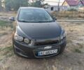 Серый Шевроле Соник, объемом двигателя 1.8 л и пробегом 129 тыс. км за 6766 $, фото 1 на Automoto.ua