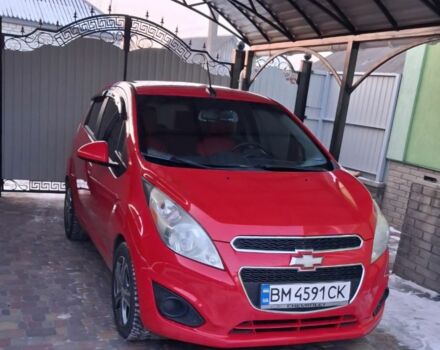 Червоний Шевроле Спарк, об'ємом двигуна 1.2 л та пробігом 83 тис. км за 7600 $, фото 1 на Automoto.ua