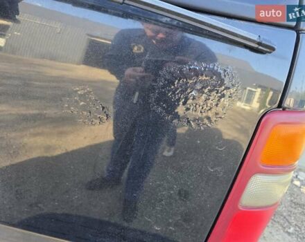 Черный Шевроле Субурбан, объемом двигателя 5.73 л и пробегом 344 тыс. км за 9300 $, фото 4 на Automoto.ua