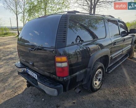 Черный Шевроле Субурбан, объемом двигателя 5.73 л и пробегом 344 тыс. км за 9300 $, фото 11 на Automoto.ua