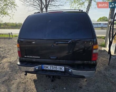 Черный Шевроле Субурбан, объемом двигателя 5.73 л и пробегом 344 тыс. км за 9300 $, фото 1 на Automoto.ua