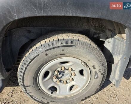 Черный Шевроле Субурбан, объемом двигателя 5.73 л и пробегом 344 тыс. км за 9300 $, фото 9 на Automoto.ua