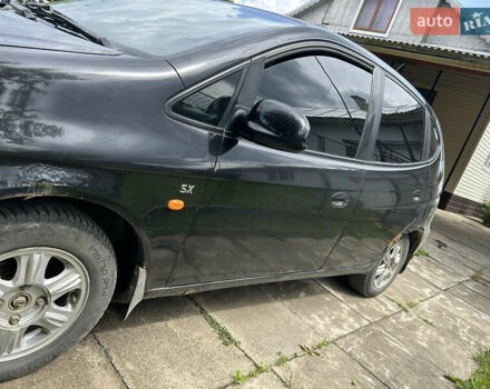 Черный Шевроле Такума, объемом двигателя 1.6 л и пробегом 240 тыс. км за 2000 $, фото 2 на Automoto.ua