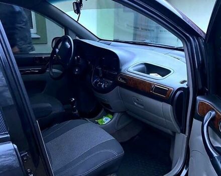 Черный Шевроле Такума, объемом двигателя 2 л и пробегом 200 тыс. км за 4600 $, фото 2 на Automoto.ua