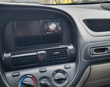 Красный Шевроле Такума, объемом двигателя 1.6 л и пробегом 143 тыс. км за 3500 $, фото 8 на Automoto.ua