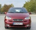 Красный Шевроле Такума, объемом двигателя 2 л и пробегом 74 тыс. км за 3999 $, фото 1 на Automoto.ua