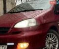Красный Шевроле Такума, объемом двигателя 2 л и пробегом 235 тыс. км за 3500 $, фото 1 на Automoto.ua