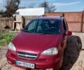 Красный Шевроле Такума, объемом двигателя 2 л и пробегом 280 тыс. км за 3200 $, фото 1 на Automoto.ua