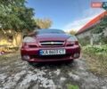 Красный Шевроле Такума, объемом двигателя 2 л и пробегом 375 тыс. км за 2600 $, фото 7 на Automoto.ua