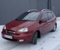Красный Шевроле Такума, объемом двигателя 2 л и пробегом 227 тыс. км за 4700 $, фото 1 на Automoto.ua