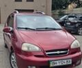 Красный Шевроле Такума, объемом двигателя 2 л и пробегом 300 тыс. км за 3250 $, фото 1 на Automoto.ua
