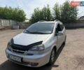 Серый Шевроле Такума, объемом двигателя 2 л и пробегом 190 тыс. км за 1250 $, фото 1 на Automoto.ua