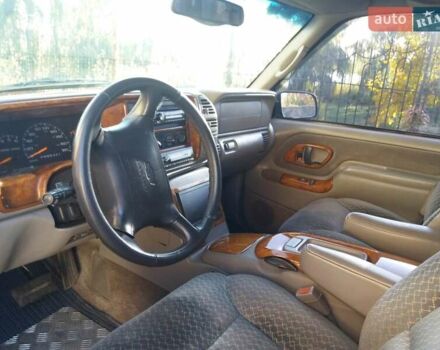 Синий Шевроле Тахо, объемом двигателя 5.7 л и пробегом 250 тыс. км за 13000 $, фото 6 на Automoto.ua