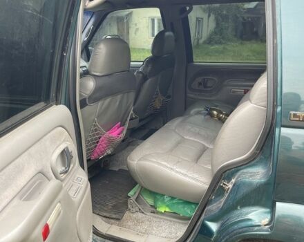 Зеленый Шевроле Тахо, объемом двигателя 5.7 л и пробегом 350 тыс. км за 6300 $, фото 3 на Automoto.ua