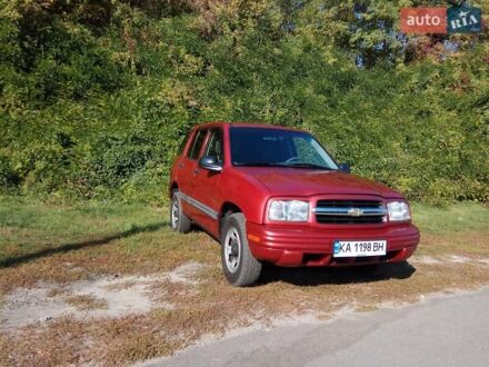 Красный Шевроле Трекер, объемом двигателя 2 л и пробегом 269 тыс. км за 4990 $, фото 1 на Automoto.ua