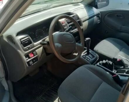 Серый Шевроле Трекер, объемом двигателя 2 л и пробегом 220 тыс. км за 3000 $, фото 10 на Automoto.ua