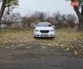 Белый Крайслер 200, объемом двигателя 2.36 л и пробегом 124 тыс. км за 9000 $, фото 1 на Automoto.ua