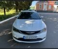 Білий Крайслер 200, об'ємом двигуна 2.4 л та пробігом 101 тис. км за 11200 $, фото 1 на Automoto.ua