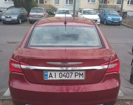 Червоний Крайслер 200, об'ємом двигуна 2.4 л та пробігом 160 тис. км за 6030 $, фото 2 на Automoto.ua