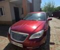 Красный Крайслер 200, объемом двигателя 2.4 л и пробегом 165 тыс. км за 6484 $, фото 1 на Automoto.ua