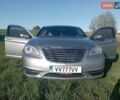 Серый Крайслер 200, объемом двигателя 2.4 л и пробегом 169 тыс. км за 6000 $, фото 1 на Automoto.ua