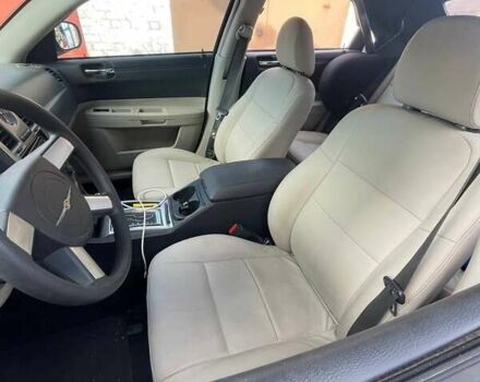 Белый Крайслер 300C, объемом двигателя 2.7 л и пробегом 90 тыс. км за 15000 $, фото 2 на Automoto.ua