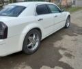 Белый Крайслер 300C, объемом двигателя 2.7 л и пробегом 246 тыс. км за 7787 $, фото 1 на Automoto.ua
