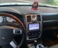 Белый Крайслер 300C, объемом двигателя 2.7 л и пробегом 210 тыс. км за 4145 $, фото 1 на Automoto.ua