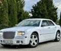 Белый Крайслер 300C, объемом двигателя 2.7 л и пробегом 224 тыс. км за 6000 $, фото 1 на Automoto.ua
