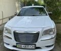 Білий Крайслер 300C, об'ємом двигуна 3 л та пробігом 140 тис. км за 15000 $, фото 1 на Automoto.ua