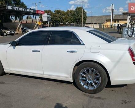 Белый Крайслер 300C, объемом двигателя 3.6 л и пробегом 140 тыс. км за 11300 $, фото 3 на Automoto.ua