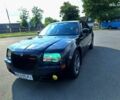 Черный Крайслер 300C, объемом двигателя 3.5 л и пробегом 275 тыс. км за 8200 $, фото 1 на Automoto.ua