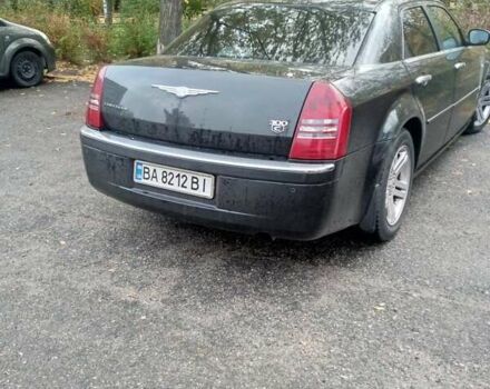 Черный Крайслер 300C, объемом двигателя 3.52 л и пробегом 250 тыс. км за 10000 $, фото 1 на Automoto.ua