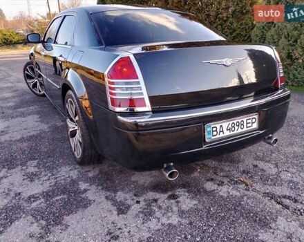 Черный Крайслер 300C, объемом двигателя 3.5 л и пробегом 202 тыс. км за 7593 $, фото 4 на Automoto.ua