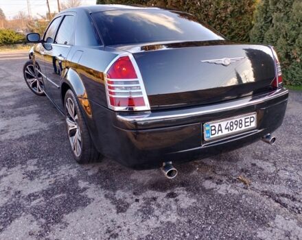 Черный Крайслер 300C, объемом двигателя 3.5 л и пробегом 202 тыс. км за 7593 $, фото 5 на Automoto.ua