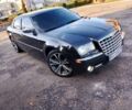 Черный Крайслер 300C, объемом двигателя 3.5 л и пробегом 202 тыс. км за 7593 $, фото 1 на Automoto.ua